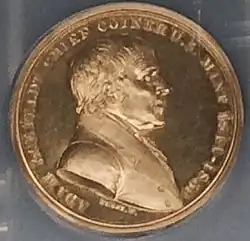 Médaille représentant le buste d'un homme, tourné vers la droite.