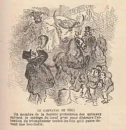 Un homme soufflant dans une trompette devant le passage du cortège avec en arrière-plan une boucherie
