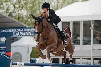 Fair Light van't Heike montée par Edwina Tops-Alexander sur une étape du Global Champions Tour en 2013