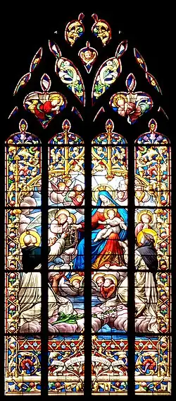 Vitrail : La vierge Marie remet le rosaire à Saint Dominique