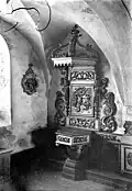 Le retable des fonts baptismaux.