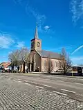 Église Saint-Ghislain, vue depuis la chaussée de Beaumont.