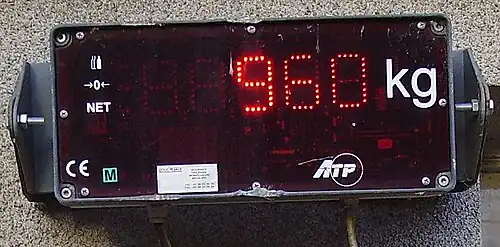 Son indicateur de pesage, lié au capteur de force.