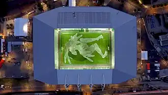 Oeuvre d'Ella et Pitr dans le stade.