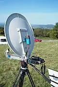 Émetteur 10 GHz (bande X) radioamateur utilisant parabole de 40 cm et transverter de puissance 1W pour liaisons à longue distance.
