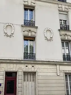 No&nbsp;11 : enseigne de maréchal-ferrant.