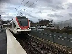 RABe 522 211 à la halte TER de Meroux.