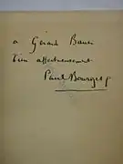 Note manuscrite sur papier jauni.