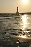 2008 - Le phare au soleil levant côté Ouest.