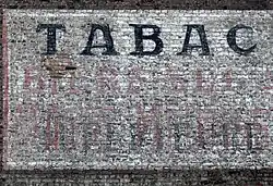 Ancienne publicité murale à Lille en France.