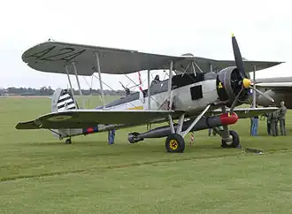 Warbird Swordfish armé d’une torpille aérienne inerte en 2002
