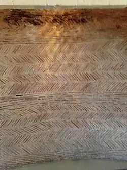 Contrecœur de cheminée du XIIe siècle au château de Falaise.