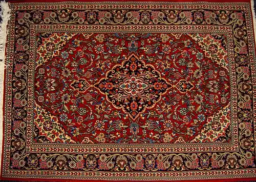 Art textile : tapis iranien provenant de Qom, en « Lachak Toranj » (après 1930).
