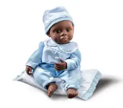 Poupon réalisé en pâte Fimo.