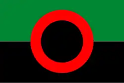 Drapeau constitué de deux bandes horizontales, l'une verte (en haut), l'autre noire. Au centre, un cercle rouge entoure un disque noir.