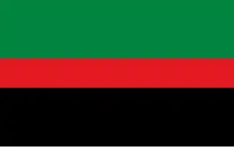 Un drapeau constitué de trois bandes, verte, rouge et noire.