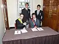 Signature d'un traité entre Flandrensis et St. Charlie à l'Intermicronational Summit 2012