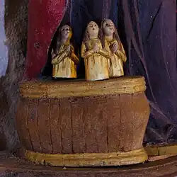 Statue de Saint Nicolas, avec les 3 jeunes filles qu'il a sauvées de la prostitution.