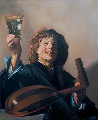 Jeune garçon avec un verre et un luth