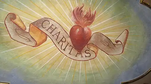 Le Sacré-Cœur, fresque dans le bassin absidial&nbsp;(it).