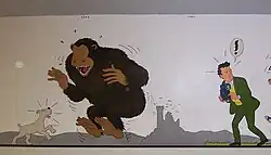 Fresque murale montrant trois personnages de bande dessinée : un chien, un gorille et un photographe.