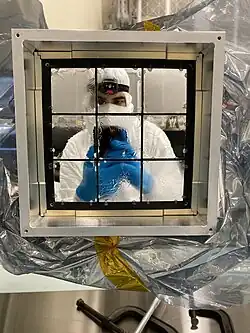 Les neuf éléments optiques de l'instrument LEXI.