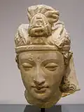 Tête de bodhisattva. Hadda. IVe ou Ve&nbsp;siècle. National Gallery of Victoria - Asian art. Melbourne, Australie.