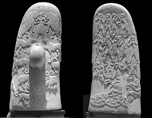 Manche du couteau de Gebel el-Arak. Ivoire. Deux faces. Abydos, 3300-3200. Musée du Louvre