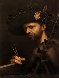 Autoportrait d'un homme barbu et coiffé d'un chapeau.