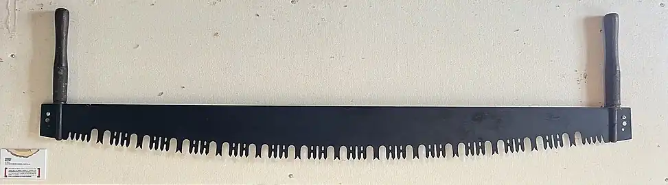 Godendart en usage au XXe siècle exposé au Moulin seigneurial de Pointe-du-Lac au Québec.