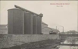 Les silos des grands moulins de Nancy au début du 20e siècle, carte postale conservée à la bibliothèque municipale de Nancy