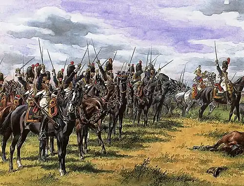 Des cavaliers avant la charge, sabre dressés.