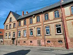 Enseigne Établissements Alfred Bertsch - façade vue de la rue - Gundershoffen - France