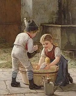 Enfants jouant à donner un bain à une poupée (1927).