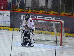 Photo de Jessica Müller, dans la tenue du HC Lugano durant une partie de Coupe d'Europe.