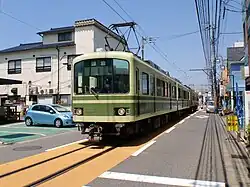 Section de voies combinée type encastrée dans la route