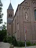 Huisseling, la tour à côté de l'église.