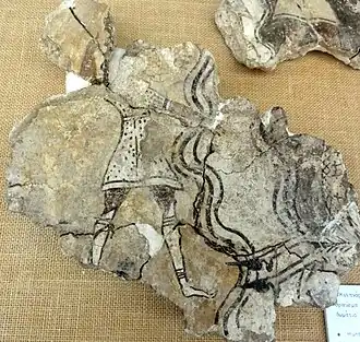 Fragment de fresque, salle 43 du palais, représentant un chasseur et un cerf.