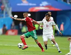 Ziyech face au milieu iranien Vahid Amiri.