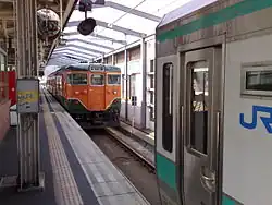 Une série 125 faisant face a une serie 115