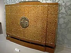 Bahut dit Meuble Élysée, marqueterie de loupe d’amboine vernie et ivoire sur bâti de chêne et tulipier, bronze argenté (1920), Paris, Mobilier national.