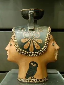 Aryballe plastique janiforme