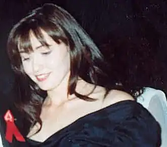 Shannen Doherty interprète Brenda Walsh.