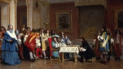 Molière le roi attablé. Le roi se tourne pour parler aux courtisans derrière lui.
