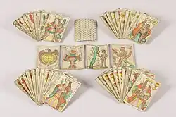 Jeu de cartes d'aluette ou de 'Vache' de l'atelier Veuve Roiné aîné de Nantes composé de 48 cartes