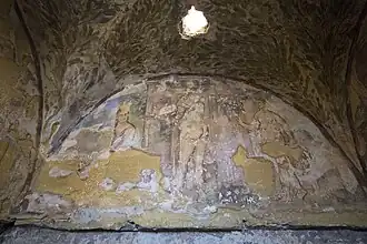 Femmes et enfant au bain.