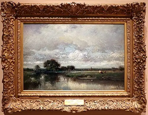 Pâturage au bord d'une mare