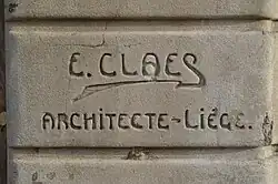 Signature de l'architecte sur la façade du Varia