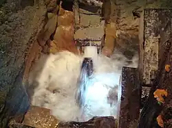 Roue à aubes entrainant l'arbre à cames