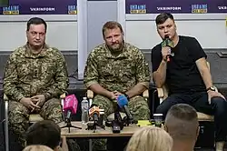 Kuzminov and Ukrainian military intelligence officers